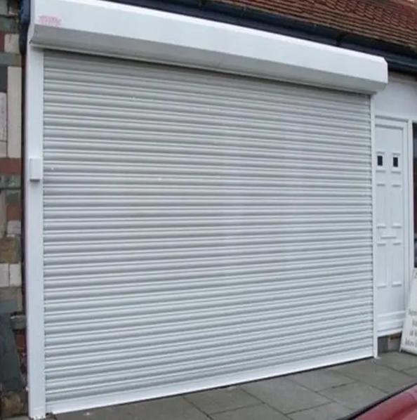 天津恒信电动门有限公司：卷帘门、电动卷帘门及电动车库门专业制造商